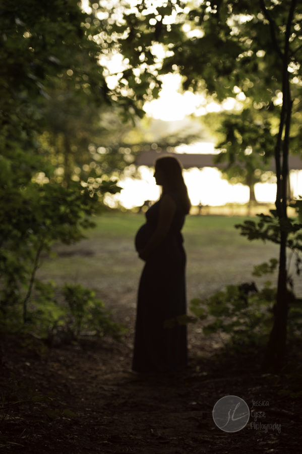 forest and lake maternity photos Greensboro NC Newborn Baby