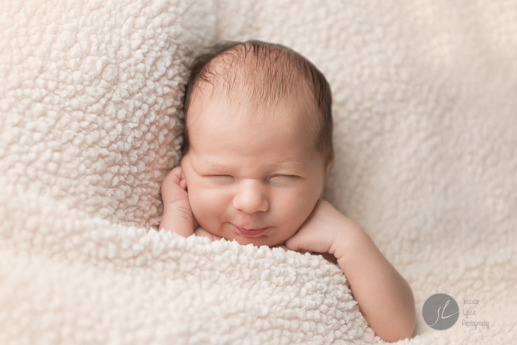 newborn smirk