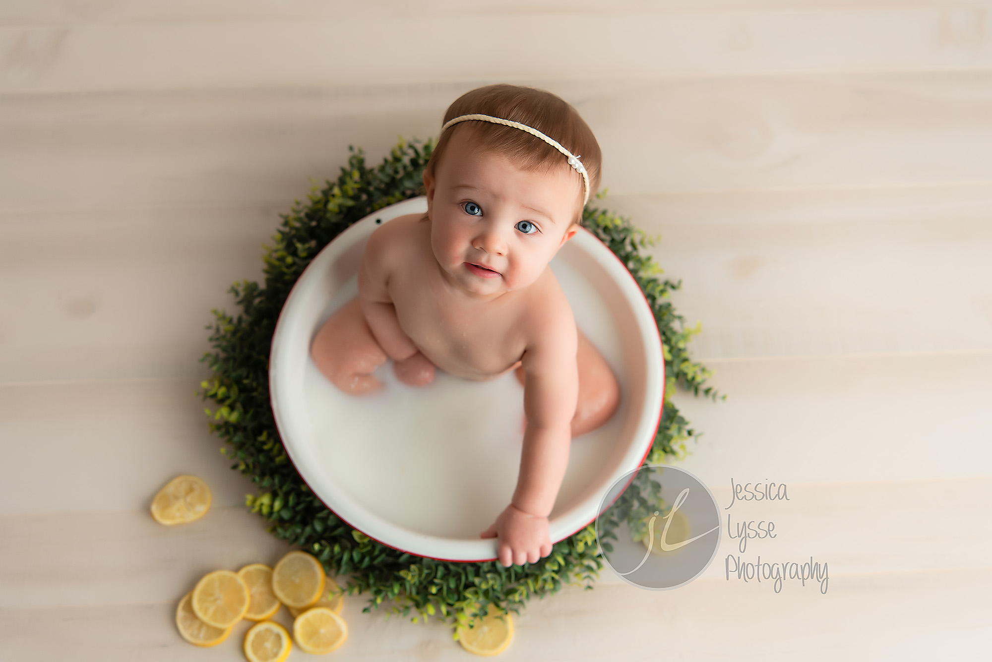 baby girl in a milk bath